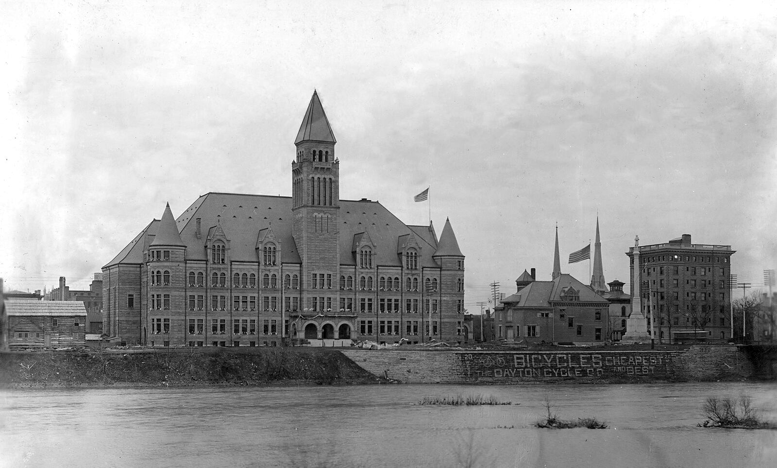 Steele High School is the centerpiece of a view of the south side of the Great Miami River photographed in 1897. DAYTON METRO LIBRARY