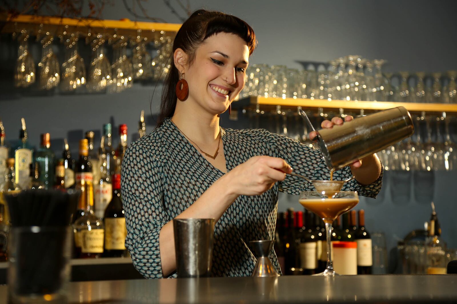 Batrender Carolyn Porter makes the seasonal cocktail Morchata at Meadowlark. JIM WITMER/STAFF