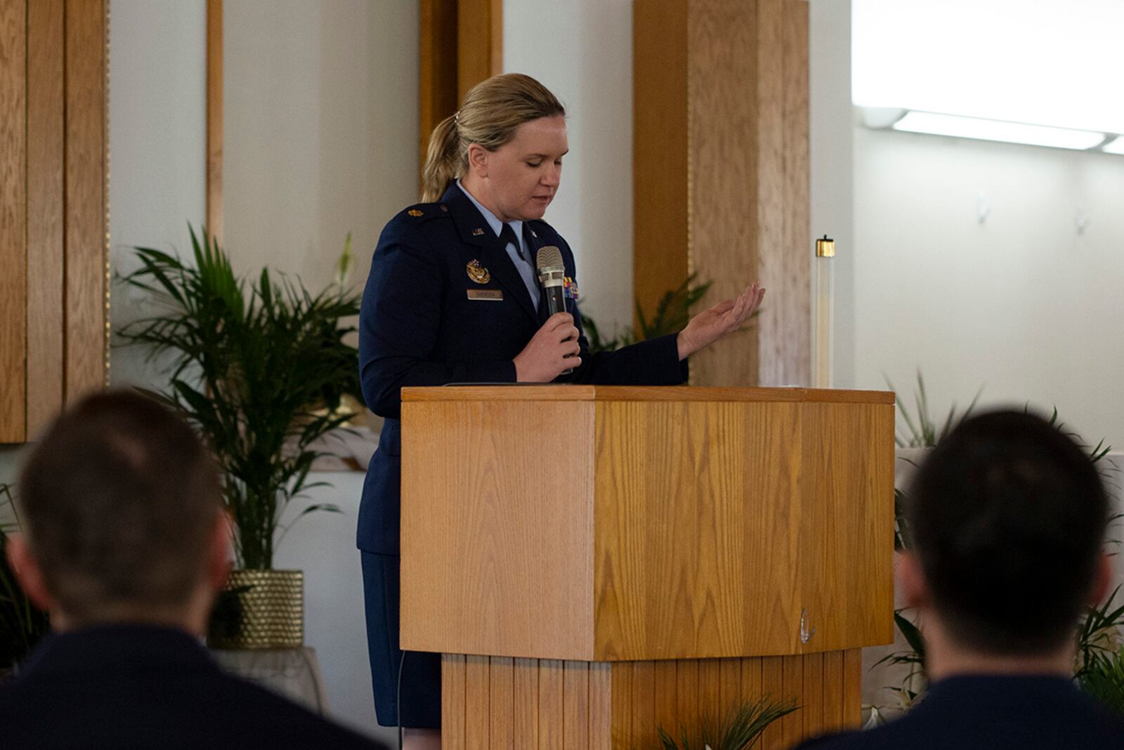 U.S. Air Force Maj. (Chaplain) Kristin Swenson leads a prayer during the Anzac Day commemoration at the Prairies Chapel on April 25 at Wright-Patterson Air Force Base. U.S. AIR FORCE PHOTO/JAIMA FOGG