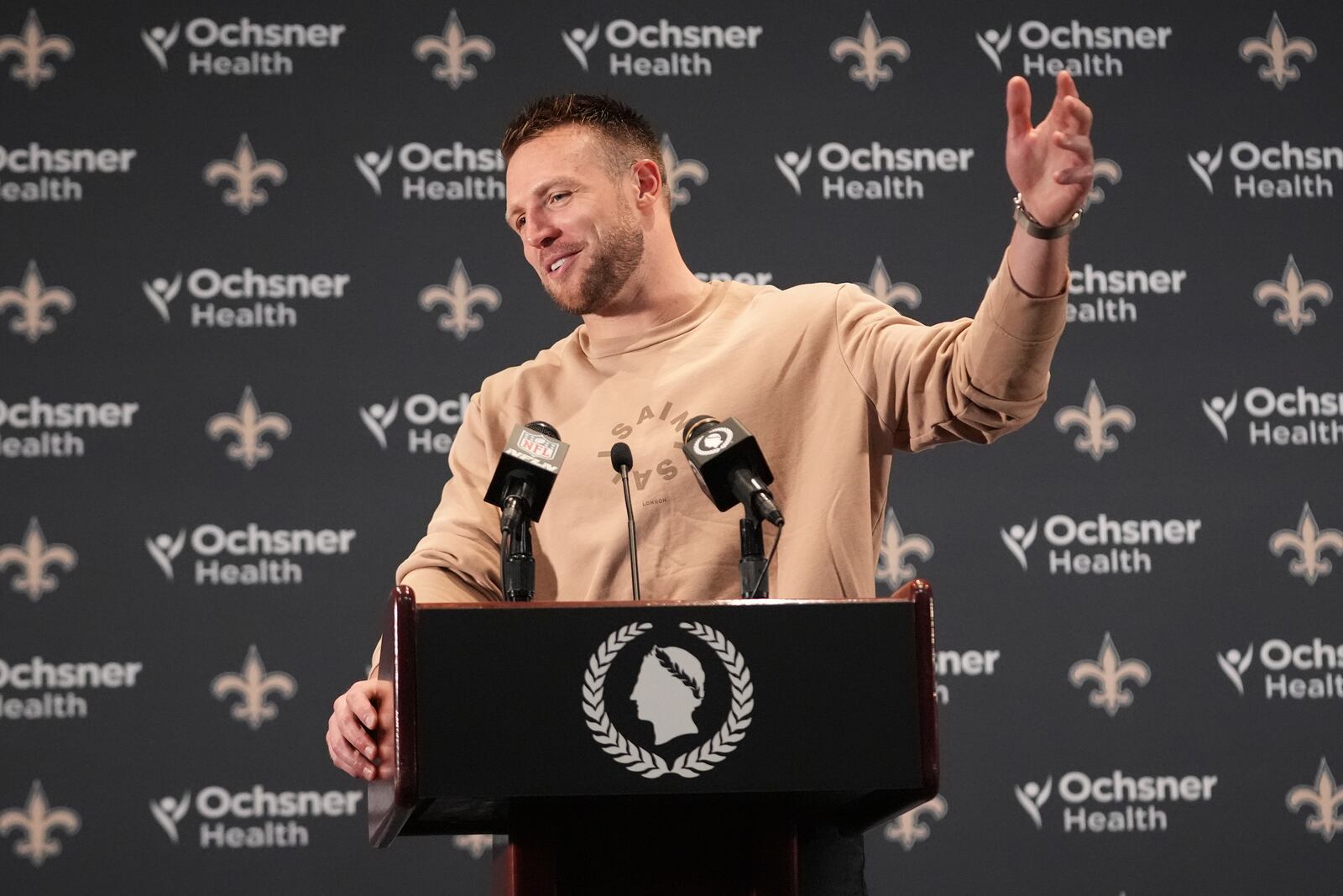 New Orleans Saints tight end Taysom Hill speaks during a news conference following an NFL football game against the Cleveland Browns in New Orleans, Sunday, Nov. 17, 2024. (AP Photo/Gerald Herbert)