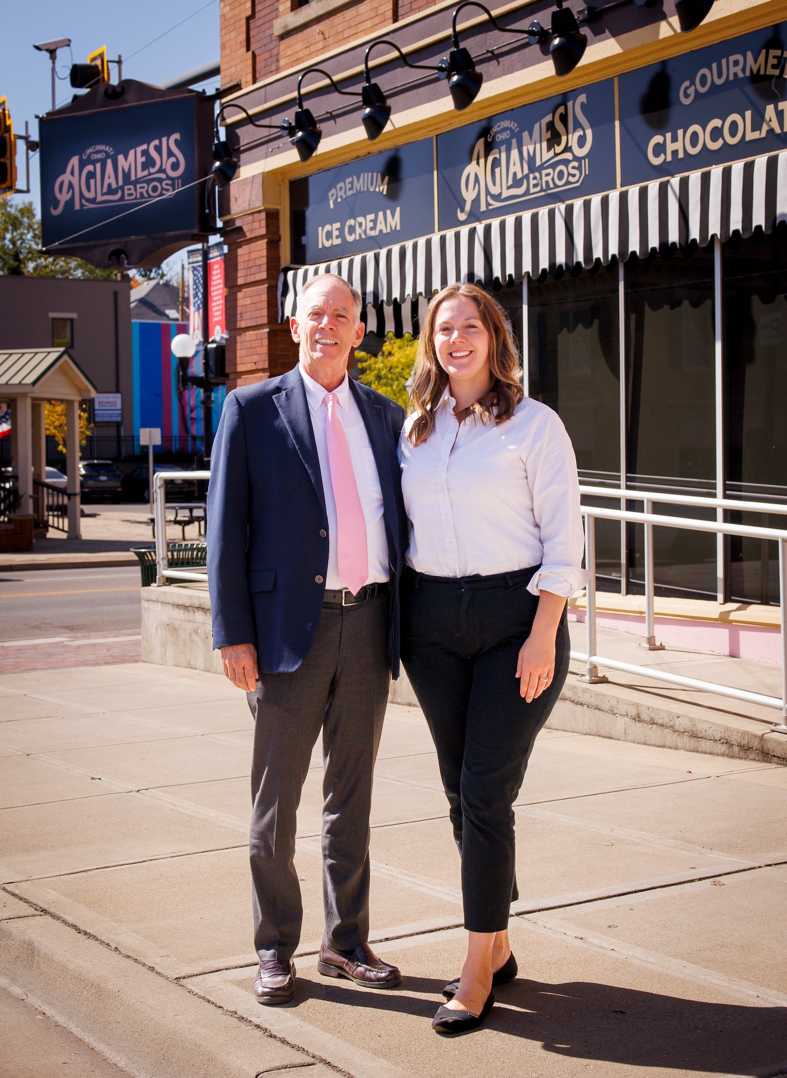 Randy Young, left, stands with his daughter Kristi Weissman outside their new Aglamesis Bros. Ice Cream & Chocolates location at corner of Main Street and D Street Wednesday, Oct. 9, 2024, in Hamilton. This is the first new location 54 years. NICK GRAHAM/STAFF