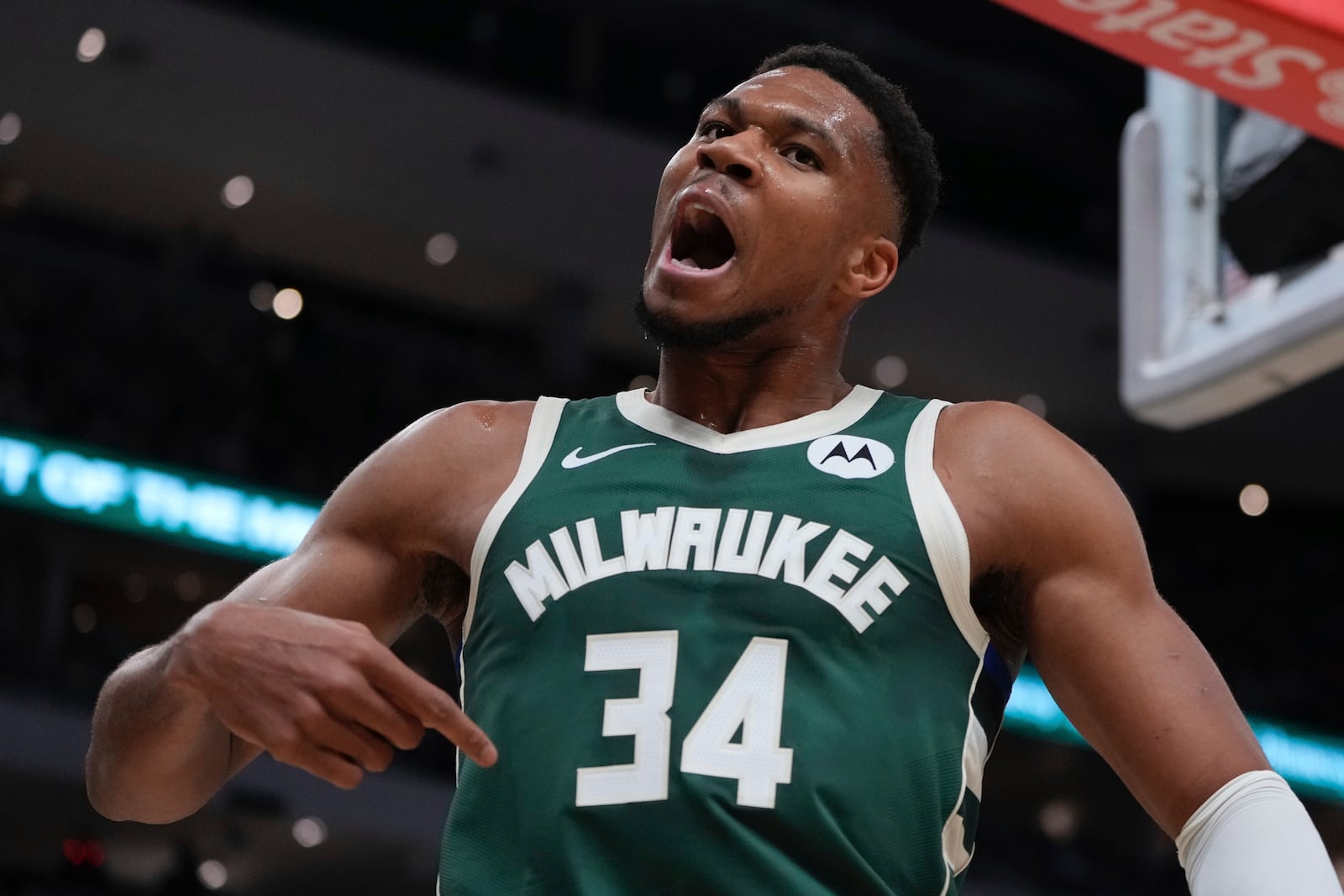 Milwaukee Bucks' Giannis Antetokounmpo reacts after making a shot and being fouled during the first half of an NBA basketball game Saturday, Nov. 2, 2024, in Milwaukee. (AP Photo/Morry Gash)