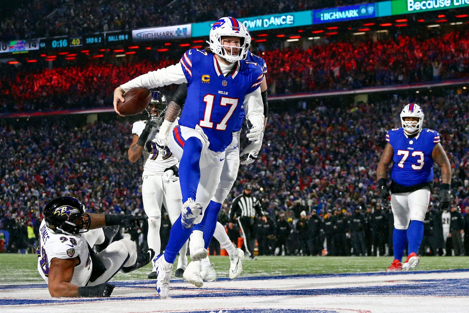 FILE - Buffalo Bills quarterback Josh Allen (17) runs into the endzone for a touchdown during to the first half of an NFL football divisional playoff game against the Baltimore Ravens in Orchard Park, N.Y., Sunday Jan. 19, 2025. (AP Photo/ Jeffrey T. Barnes, File)