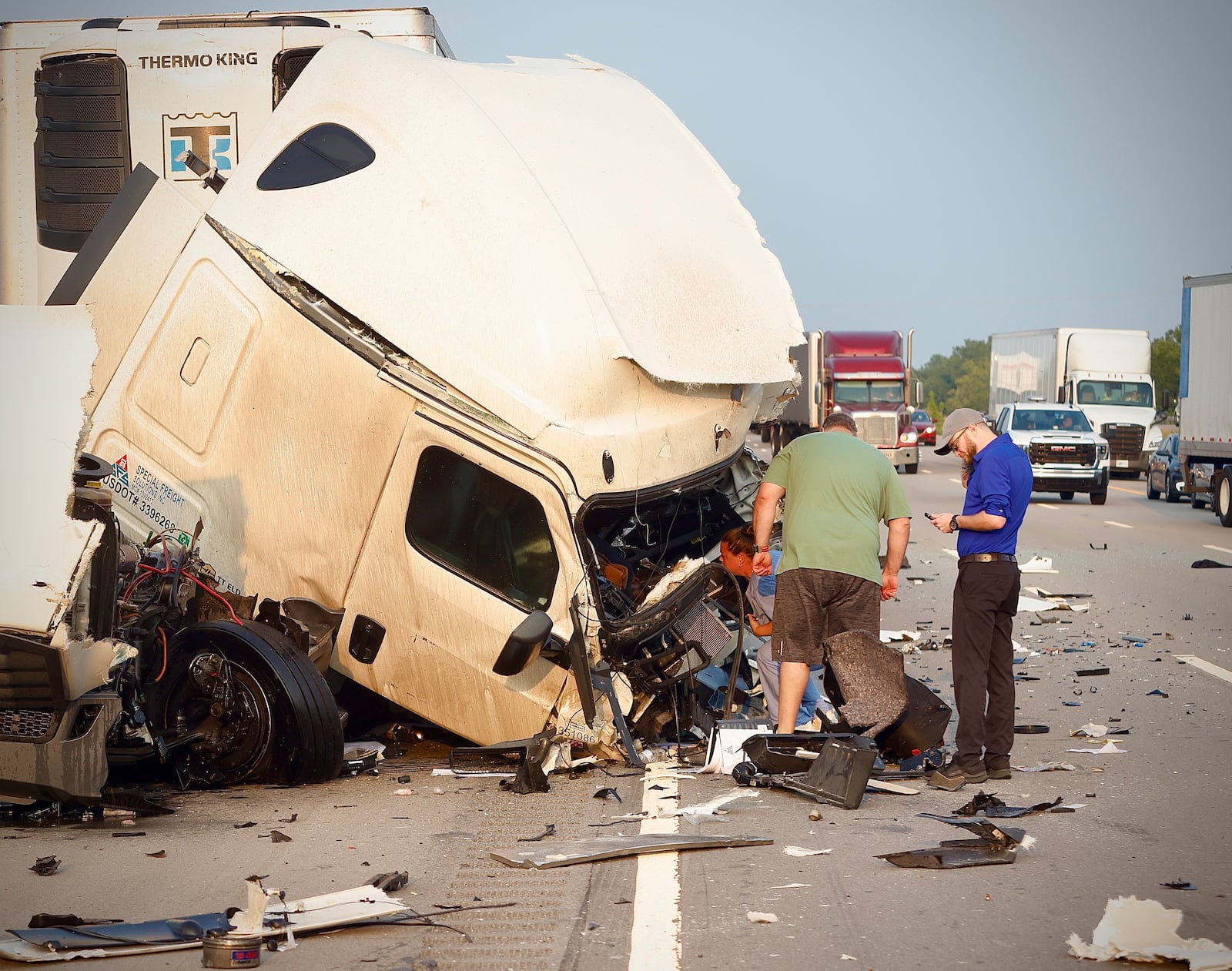 Interstate 70 East was closed Thursday morning on July 25, 2024, after a tractor-trailer was involved in a crash in Clark County. MARSHALL GORBY / STAFF