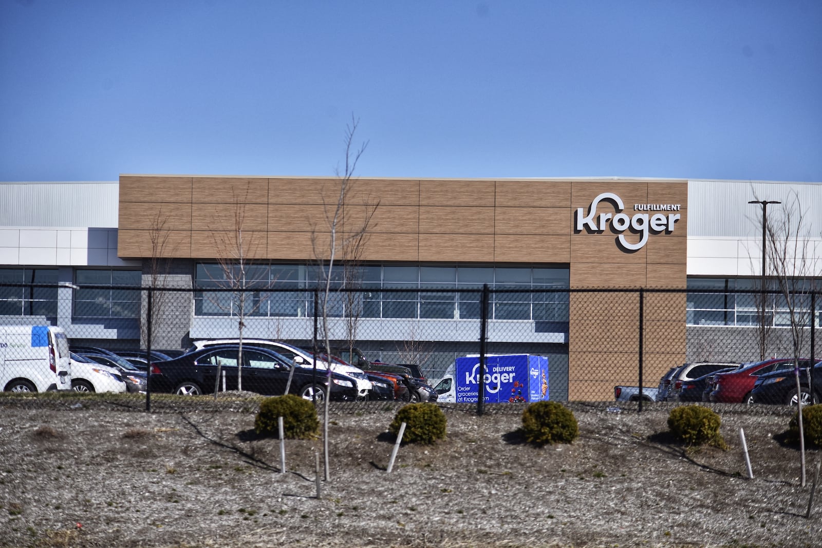 Kroger's new $55 million customer fulfillment center in Monroe is the first of 20 planned colossal automated warehouse/distribution facilities to be created as part of a partnership between Kroger and U.K.-based online grocery retailer Ocado. The 335,000-square-foot facility features digital and robotic capabilities that allow it to assemble an order of approximately 50 items in six minutes instead of approximately 30 to 45 minutes with a Kroger employee picking them up from various areas of the store. NICK GRAHAM/STAFF