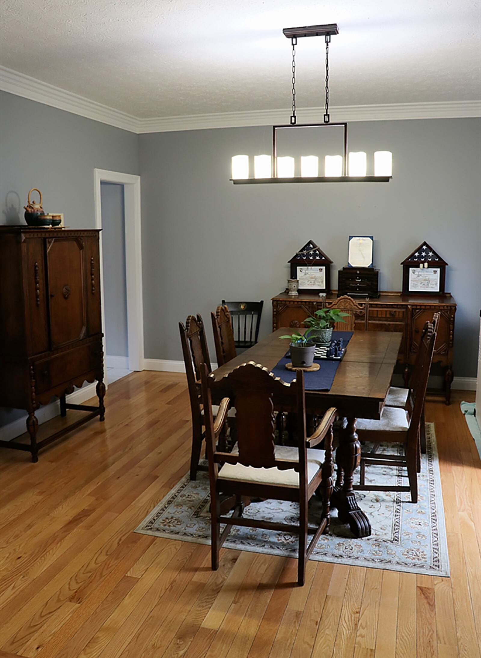 Formal entry opens into a 2-story foyer that is open into the formal dining room. Pillars accent the entry into the dining room which has hardwood flooring. CONTRIBUTED PHOTO BY KATHY TYLER