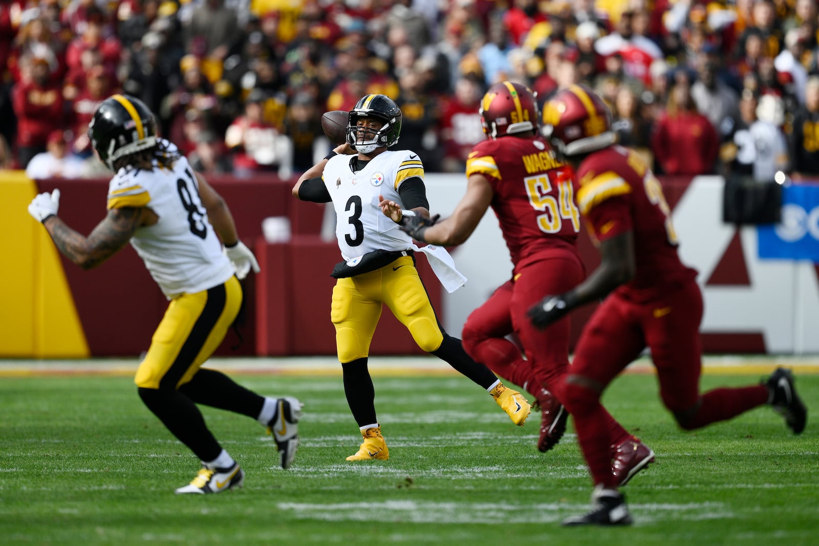 Pittsburgh Steelers quarterback Russell Wilson (3) throws during the first half of an NFL football game against the Washington Commanders, Sunday, Nov. 10, 2024, in Landover, Md. (AP Photo/Nick Wass)