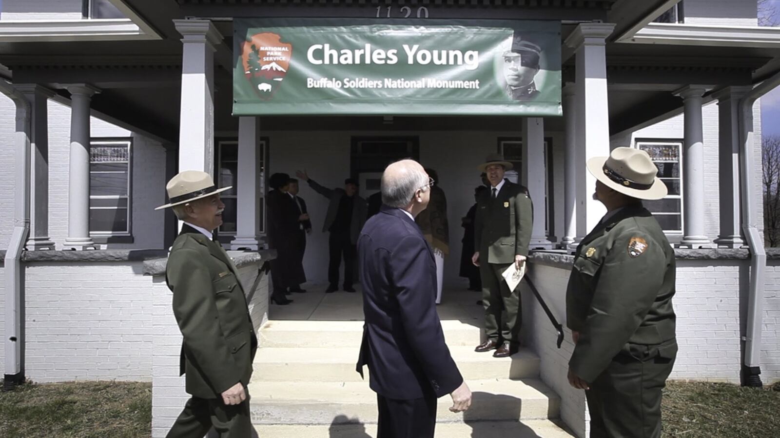 From left, National Park Service Director Jonathan Jarvis, Secretary of the Interior Ken Salazar, and Reginald Miller, superintendent of the new Charles Young Buffalo Soldiers National Monument, attend a tour of the Wilberforce home of the highest ranking African-American United States Army officer from 1894-1922. The historic home was designated a national monument last month. Young was also the first African-American superintendent of a national park. CHRIS STEWART / STAFF