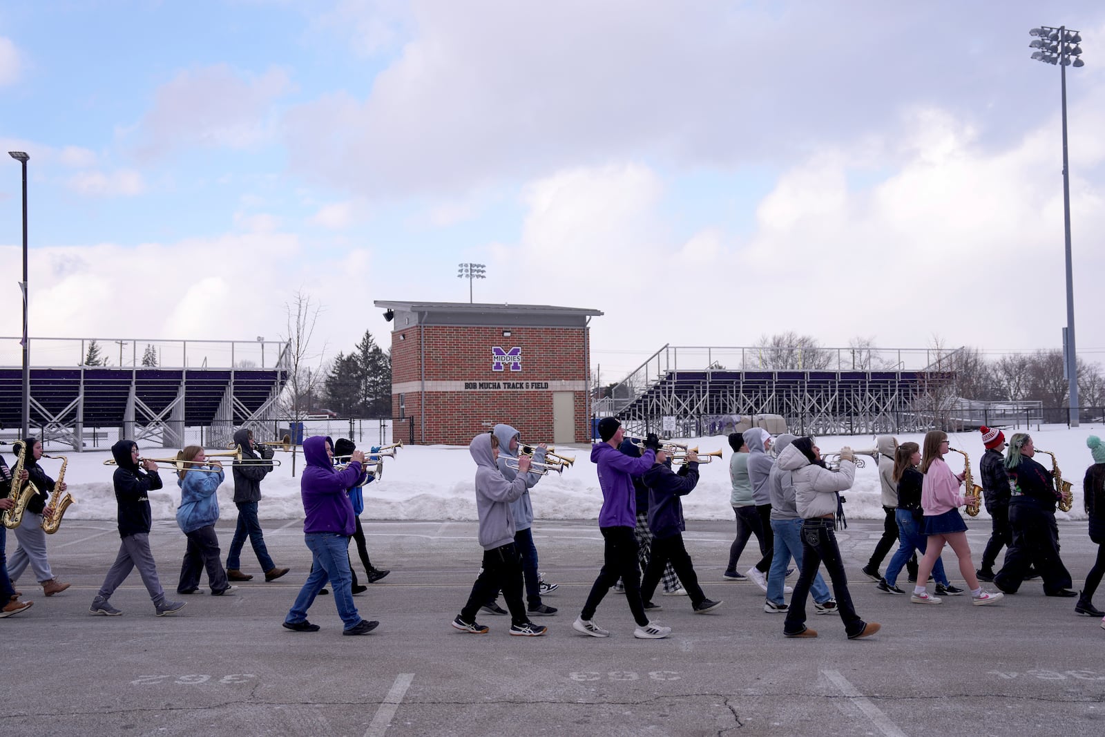 Students in the Middletown High School band practice outside, Tuesday, Jan. 14, 2025, in Middletown, Ohio. The band is set to participate in the inauguration of President-elect Donald Trump on Jan. 20. Middletown is the hometown of Vice President-elect JD Vance.(AP Photo/Kareem Elgazzar)