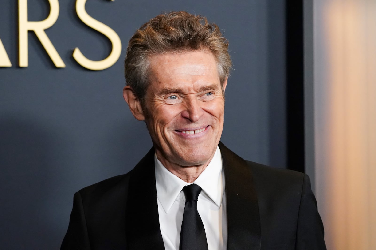 Willem Dafoe arrives at the 15th Governors Awards on Sunday, Nov. 17, 2024, at The Ray Dolby Ballroom in Los Angeles. (Photo by Jordan Strauss/Invision/AP)