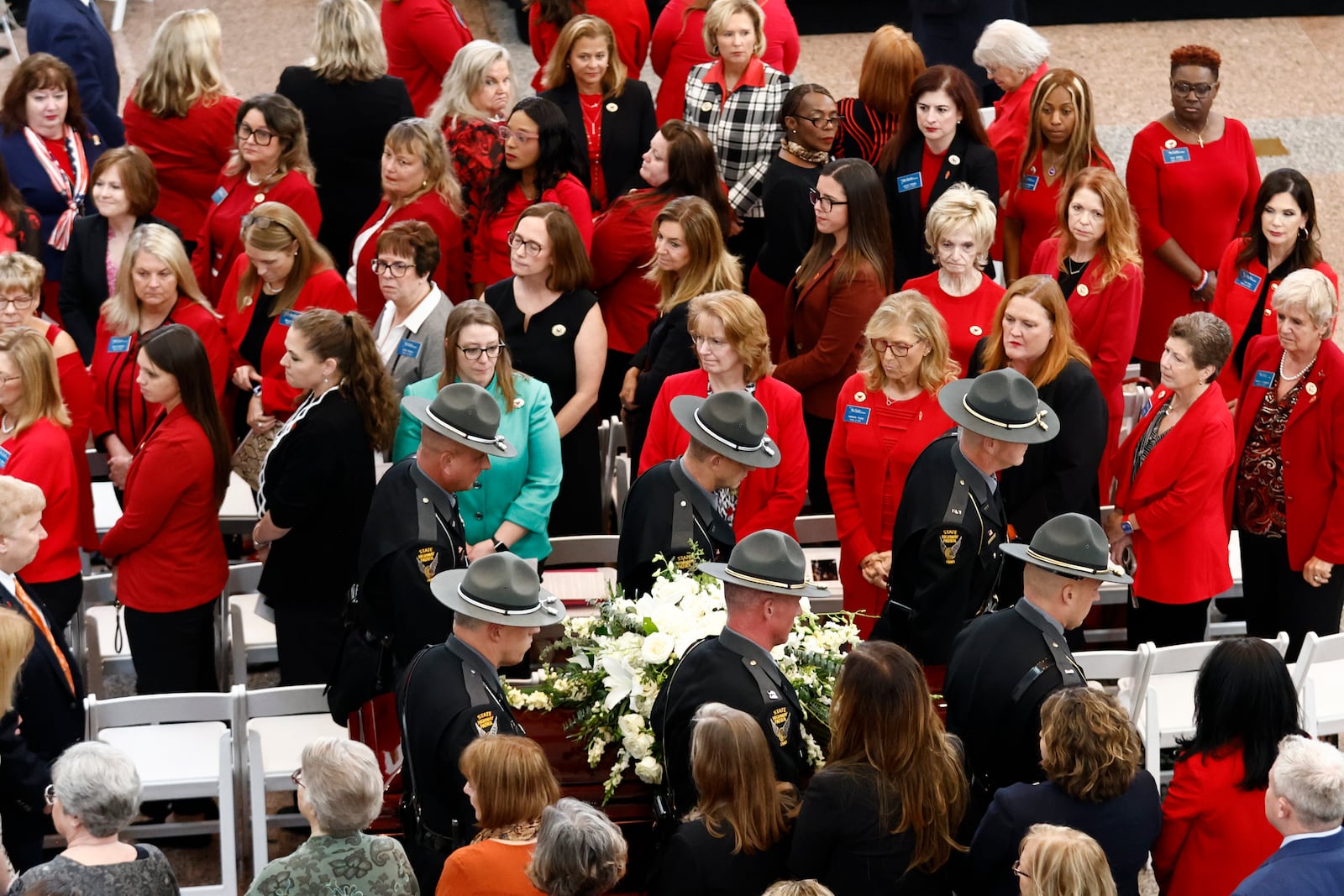 Members of the Ohio State Highway Patrol carry the casket for former Ohio House speaker Jo Ann Davidson into the atrium of the Ohio Statehouse for her funeral in Columbus, Ohio, Thursday, Oct. 31, 2024. (AP Photo/Paul Vernon)