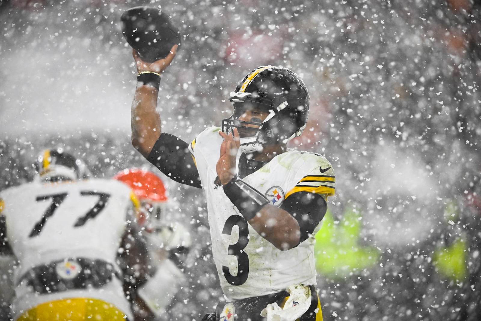 Pittsburgh Steelers quarterback Russell Wilson (3) passes in the second half of an NFL football game against the Pittsburgh Steelers, Thursday, Nov. 21, 2024, in Cleveland. (AP Photo/David Richard)