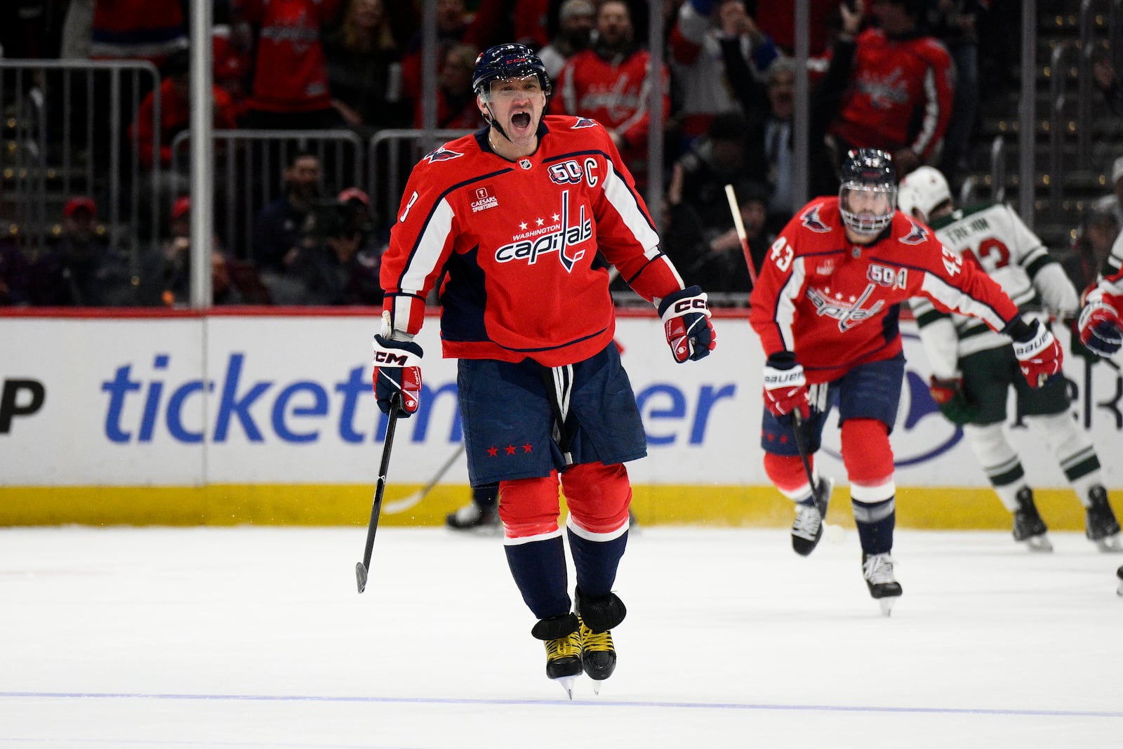 Washington Capitals left wing Alex Ovechkin (8) celebrates his goal during the second period of an NHL hockey game against the Minnesota Wild, Thursday, Jan. 2, 2025, in Washington. (AP Photo/Nick Wass)