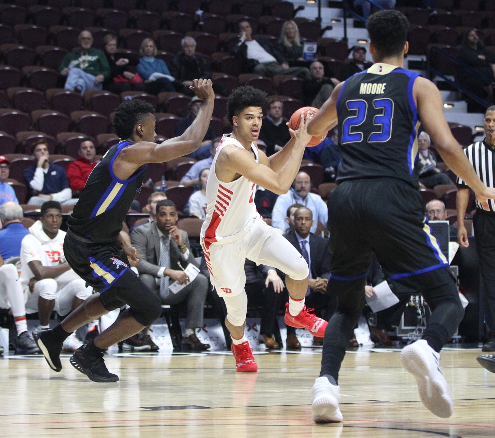 Dayton’s Frankie Policelli dribbles against Tulsa on Sunday, Dec. 16, 2018, at Mohegan Sun Arena in Uncasville, Conn.