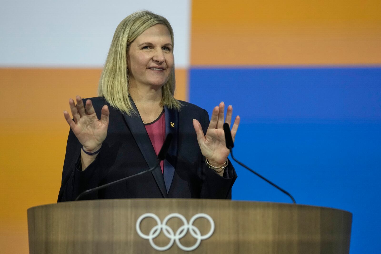 Kirsty Coventry gestures as she speaks after she was announced as the new IOC President at the International Olympic Committee 144th session in Costa Navarino, western Greece, Thursday, March 20, 2025. (AP Photo/Thanassis Stavrakis)