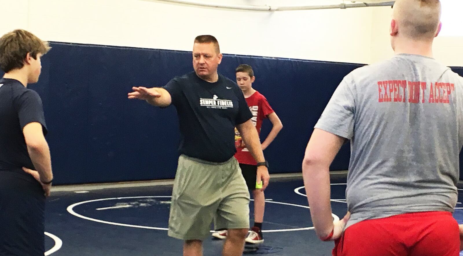 Talawanda High School football coach Larry Cox directs a recent workout at the school. FILE