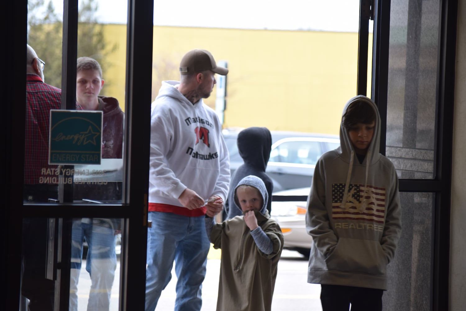 PHOTOS: Hundreds like up outside JCPenney for doorbusters, coupons