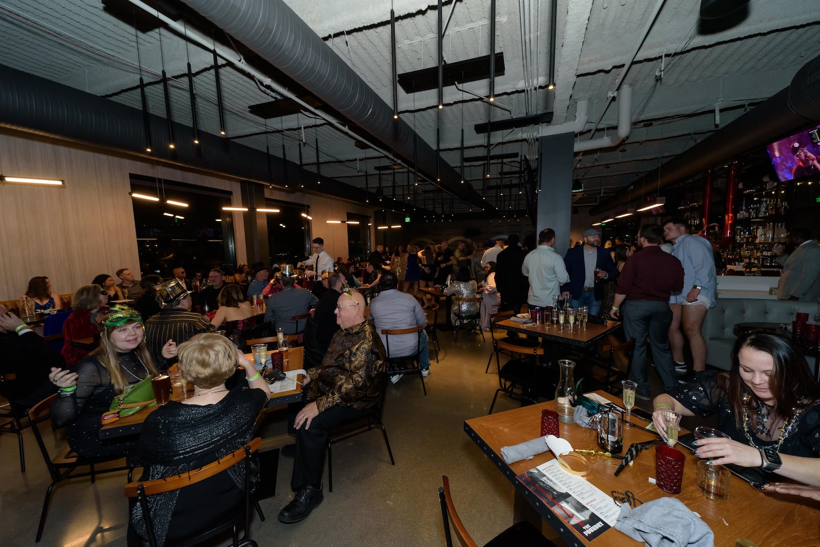 The Foundry Rooftop bar & restaurant at the AC Hotel by Marriott in downtown Dayton held its first New Year’s Eve party Midnight Masquerade on Sunday, Dec. 31, 2023. Did we spot you there? TOM GILLIAM / CONTRIBUTING PHOTOGRAPHER