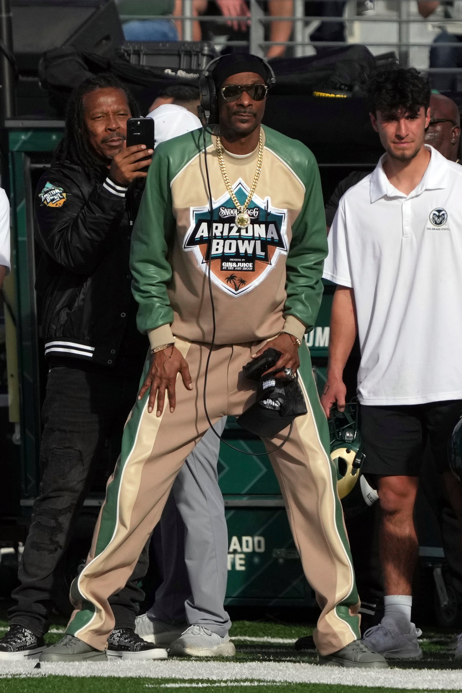 Snoop Dogg watches the play between Colorado State and Miami (Ohio) in the first half of the Arizona Bowl NCAA college football game, Saturday, Dec. 28, 2024, in Tucson, Ariz.