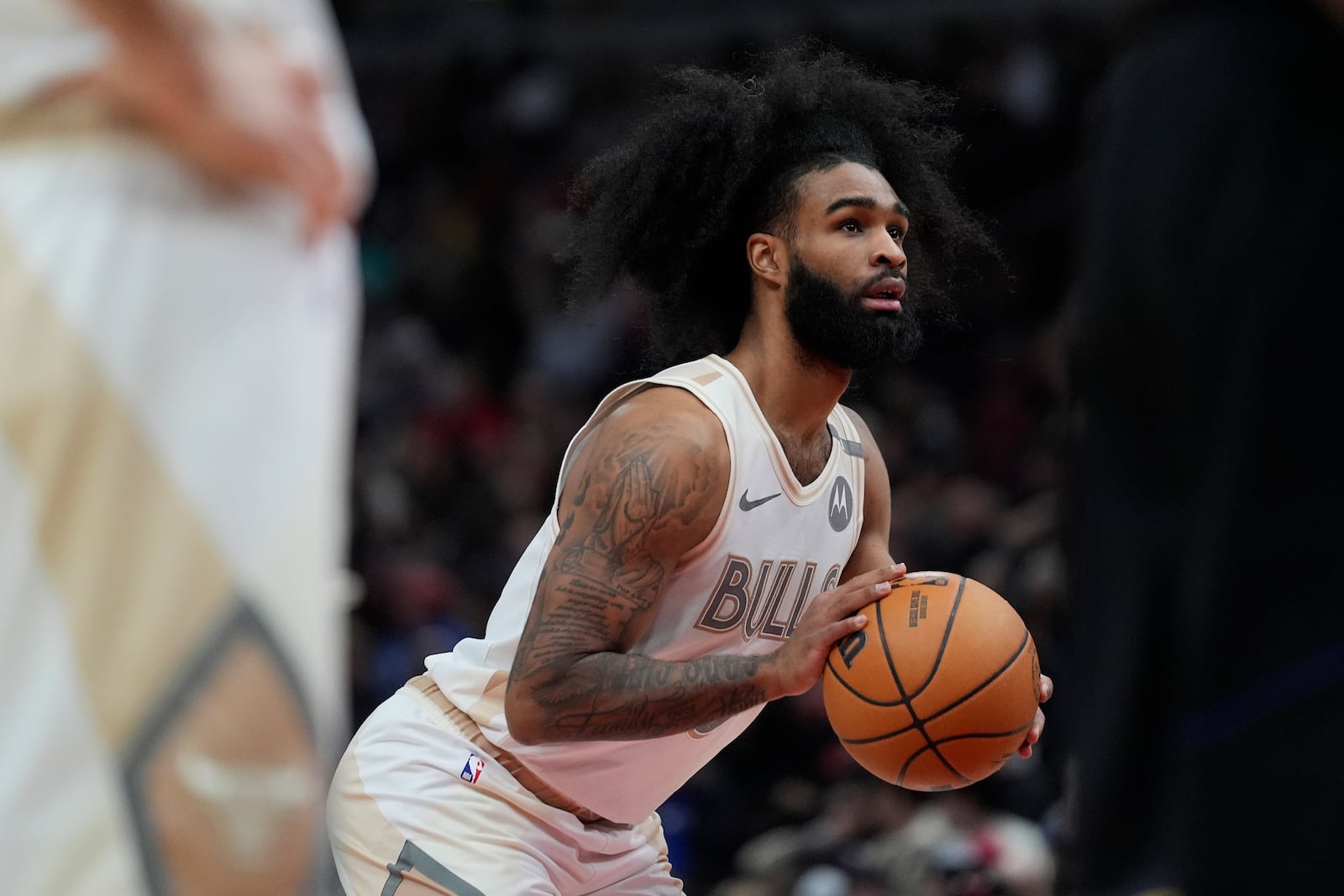 Chicago Bulls guard Coby White prepares to take a free throw during the first half of an NBA basketball game against the Golden State Warriors, Saturday, Feb. 8, 2025, in Chicago. (AP Photo/Erin Hooley)