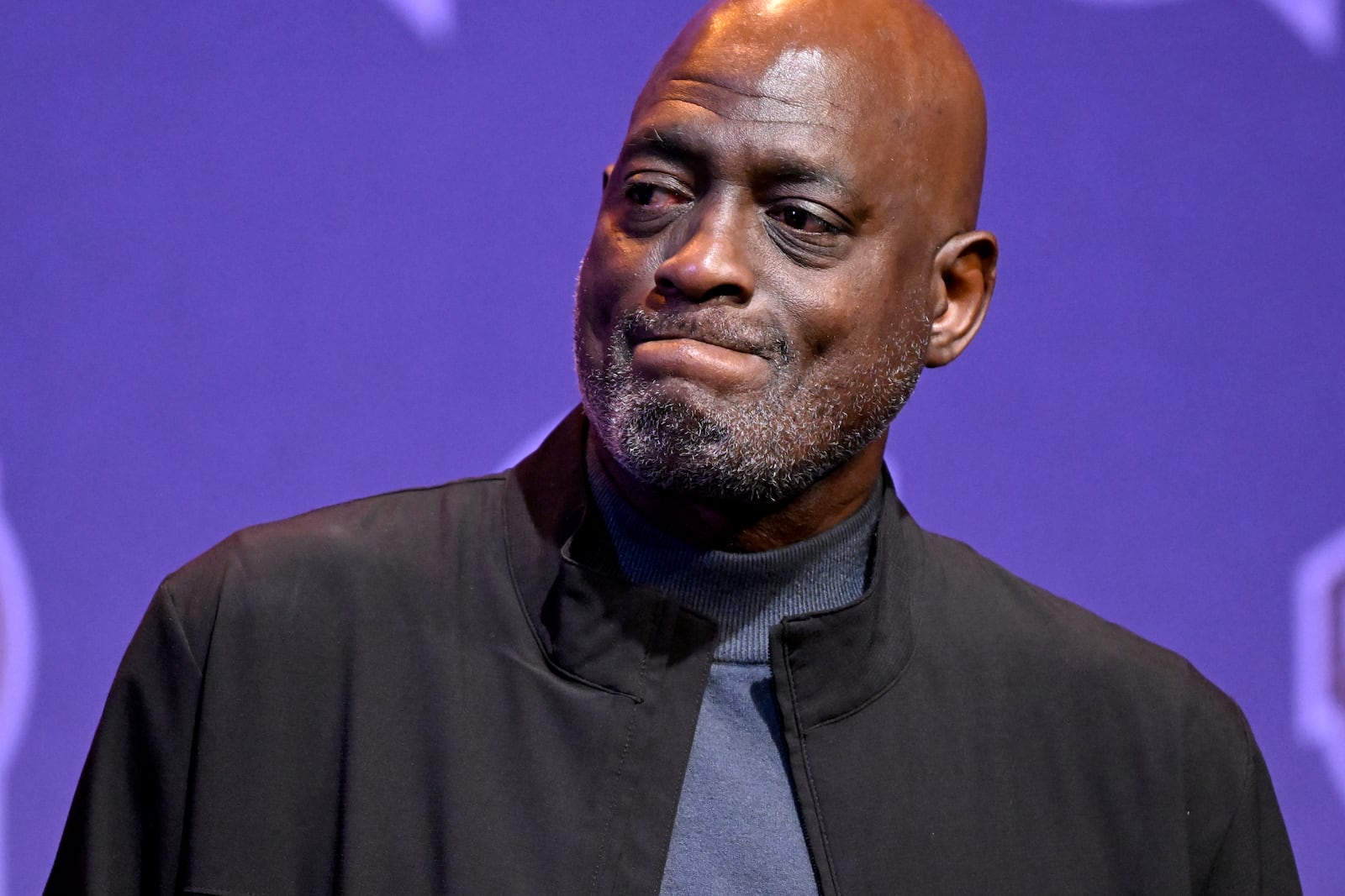 Basketball Hall of Fame Class of 2024 inductee Michael Cooper reacts while talking about the late Jerry West at an NBA news conference at Mohegan Sun in Uncasville, Conn., Saturday, Oct. 12, 2024.(AP Photo/Jessica Hill)