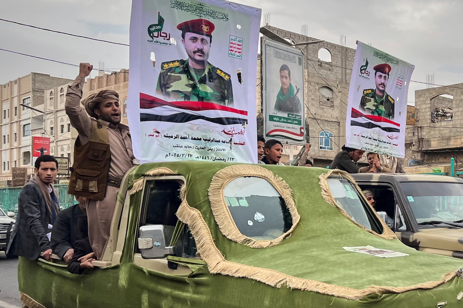 Houthi supporters participate in a funeral procession for Osama Al-rumeitha, a Houthi officer, who was reportedly killed in a recent U.S. airstrike, in Sanaa, Yemen, Monday, March 24, 2025. (AP Photo)