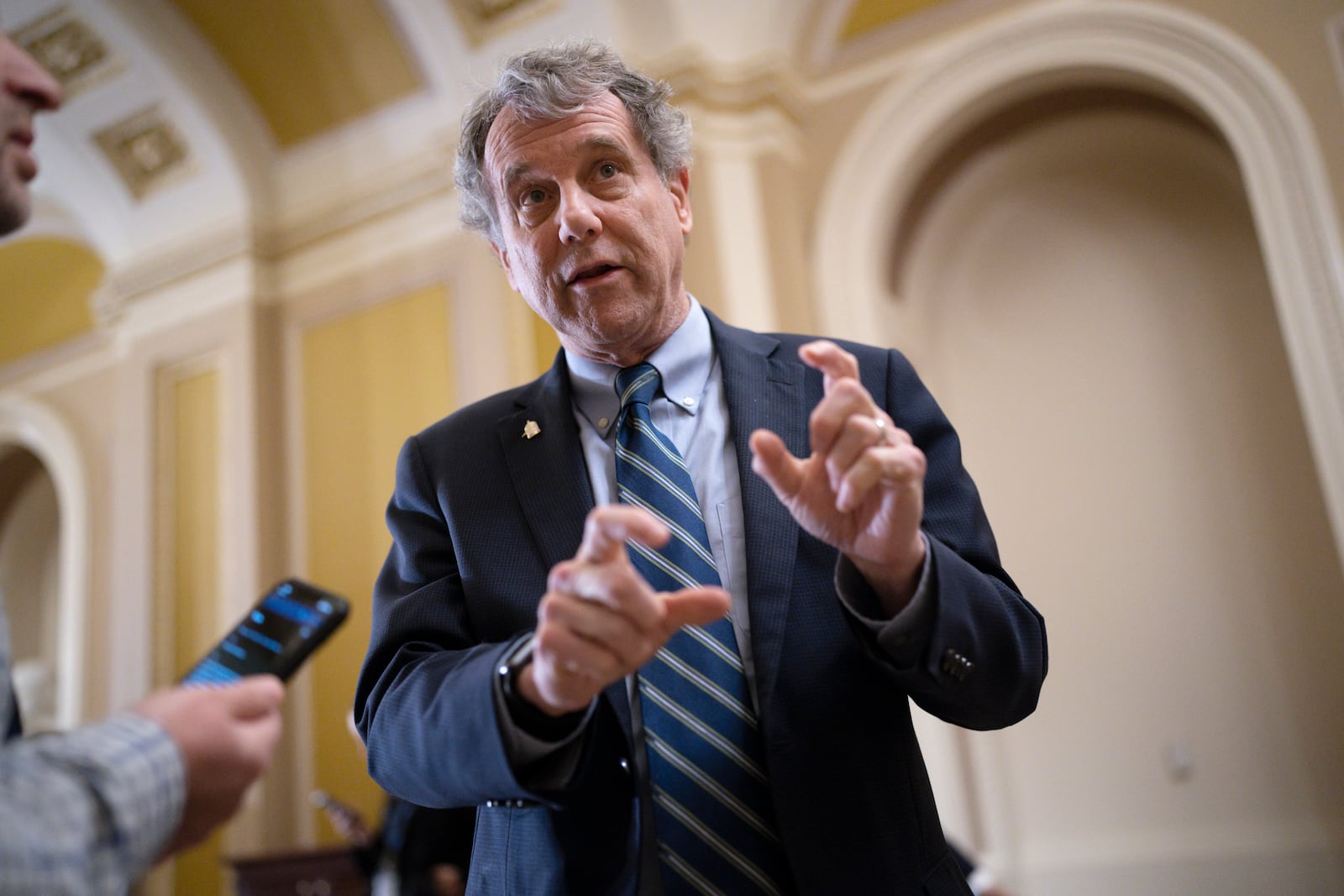 FILE - Senate Banking Committee Chairman Sherrod Brown, D-Ohio, speaks with reporters at the Capitol in Washington, March 15, 2023. (AP Photo/J. Scott Applewhite, File)