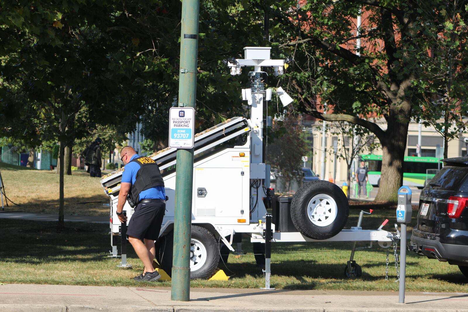 Dayton police officials on Wednesday, Sept. 20, 2023, installed a mobile crime unit trailer on South Jefferson Street by the Levitt Pavilion Dayton that has security cameras. The trailer was placed there one day after two people were shot in the area, along the 100 block of South Jefferson Street. CORNELIUS FROLIK / STAFF