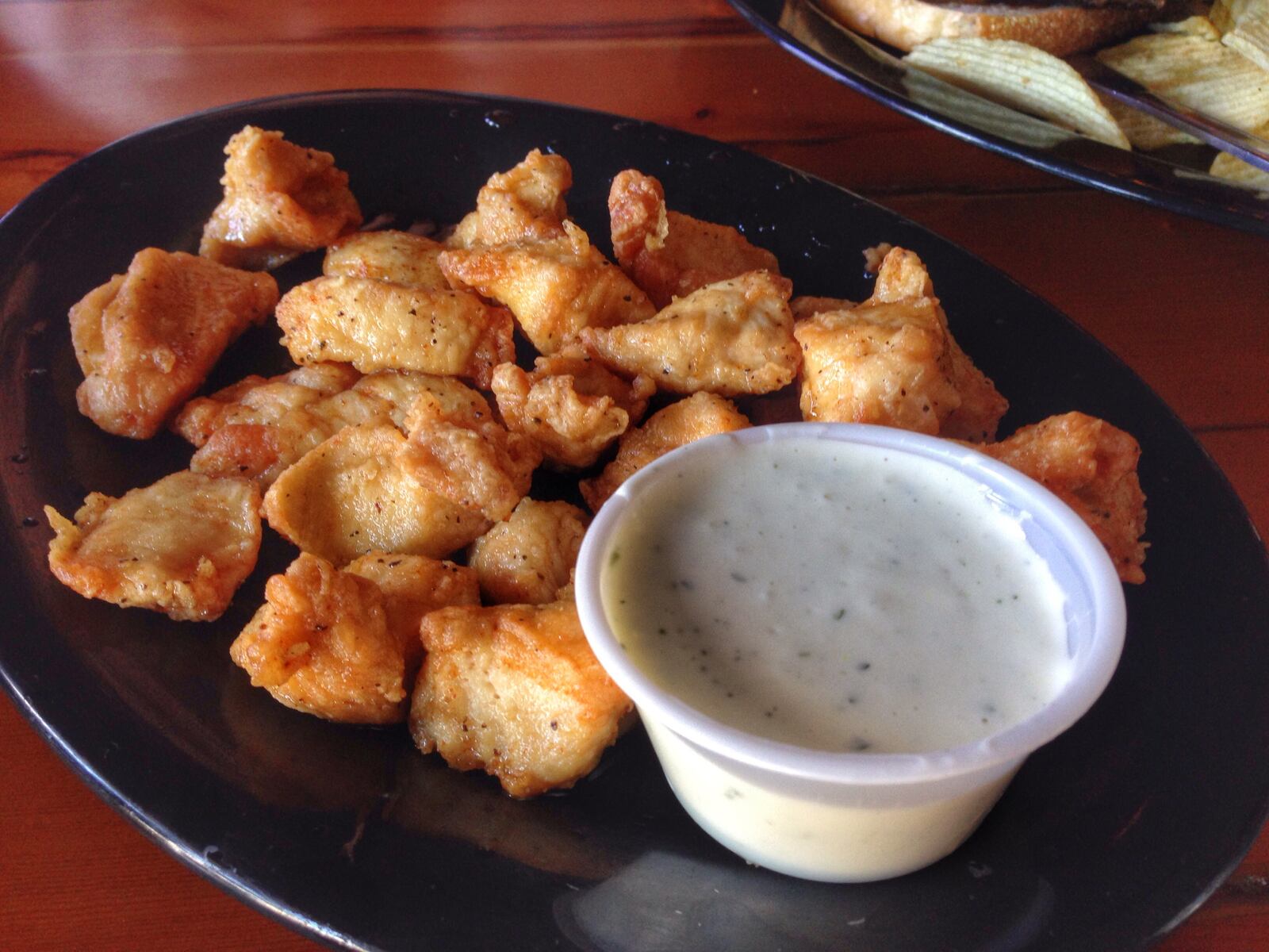 Bottom line: Hinders' Butt Warmer Chicken Hunks are delicious chicken breast chunks lightly breaded and coated with a sweet and tangy sauce. CONNIE POST/Photo