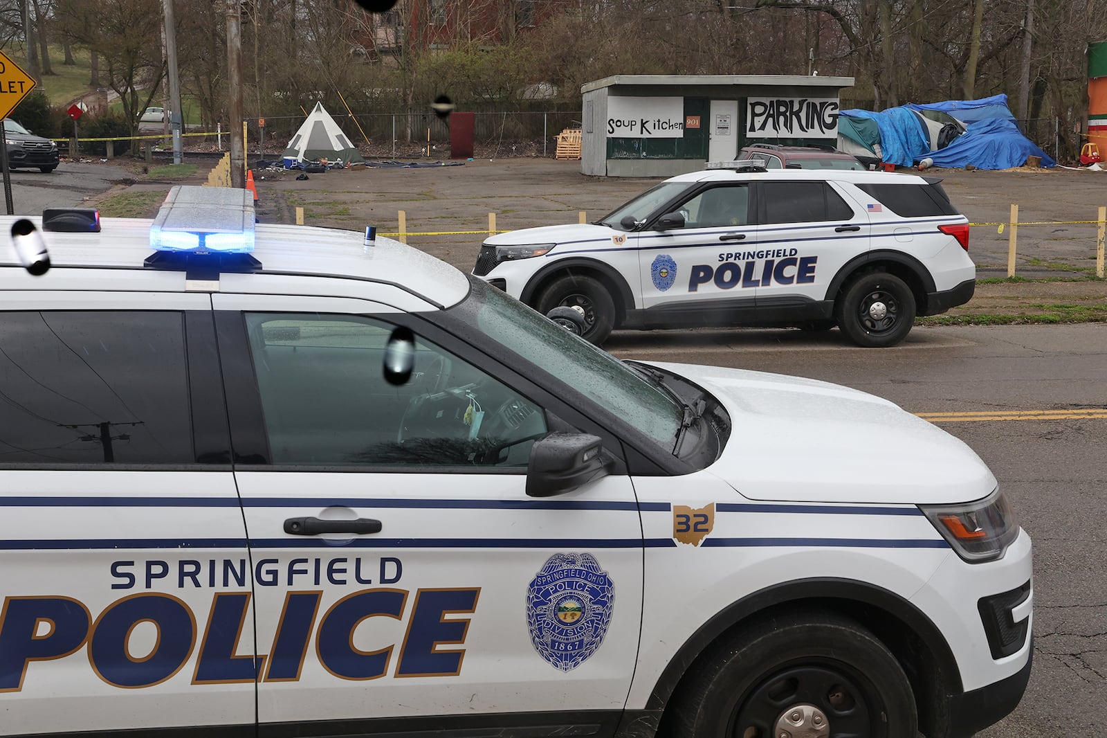 Springfield police investigate a homicide at a homeless encampment at 901 West Main Street Wednesday, April 6, 2022. BILL LACKEY/STAFF