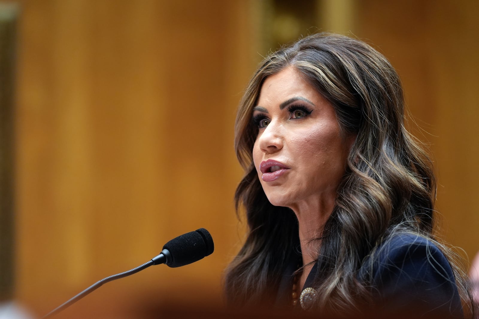 South Dakota Gov. Kristi Noem, President-elect Donald Trump's nominee to be Secretary of Homeland Security, appears before the Senate Homeland Security and Governmental Affairs Committee for her confirmation hearing, at the Capitol in Washington, Friday, Jan. 17, 2025. (AP Photo/Susan Walsh)