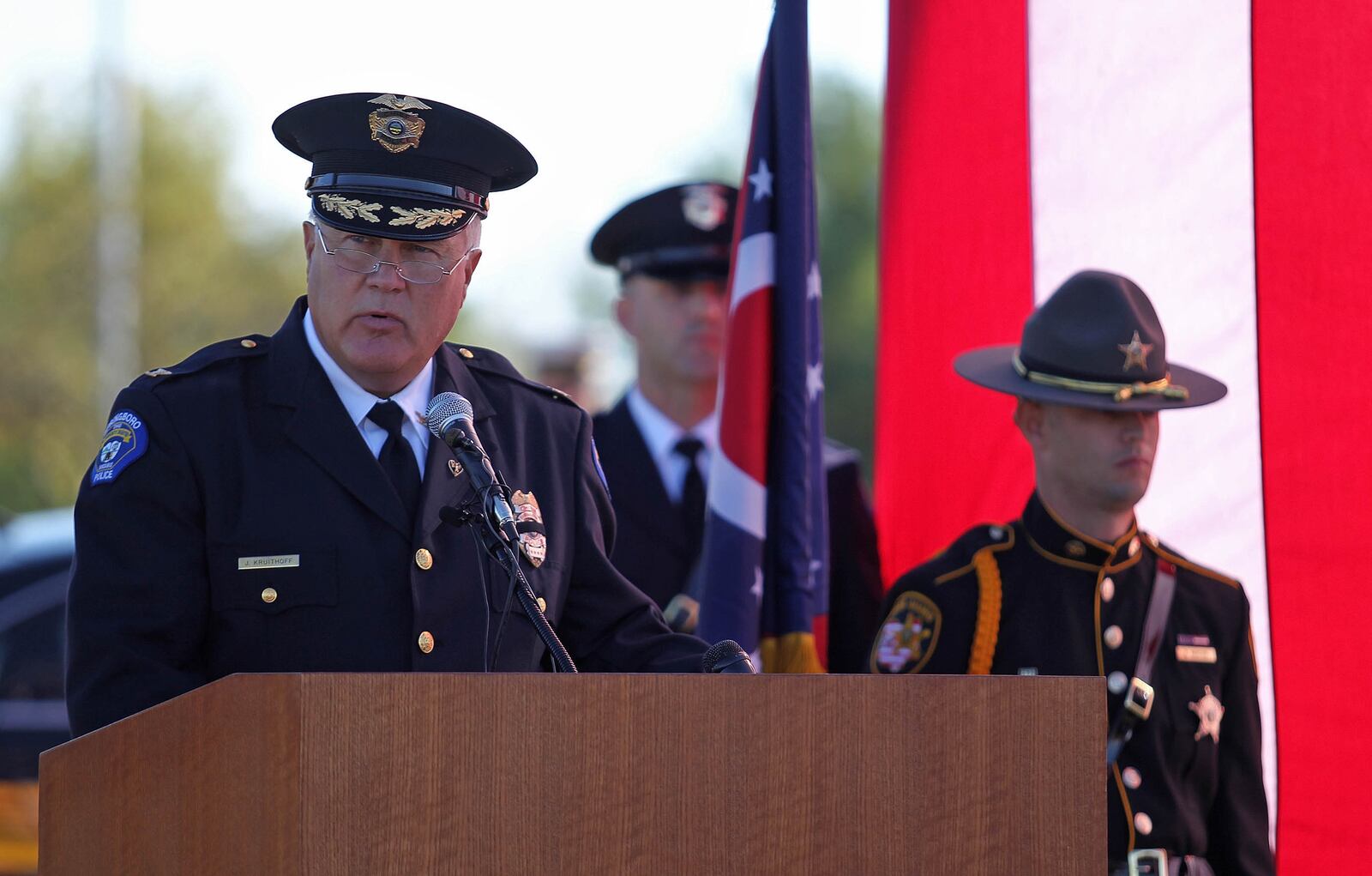 Springboro Police Chief Jeff Kruithoff recites Words of Remembrance during the September 11, Remembrance Ceremony and Commemoration at the Warren County 9/11 Memorial, Tuesday, September 11, 2012, in Lebanon. Photo by Robert Leifheit/Contributing Photographer