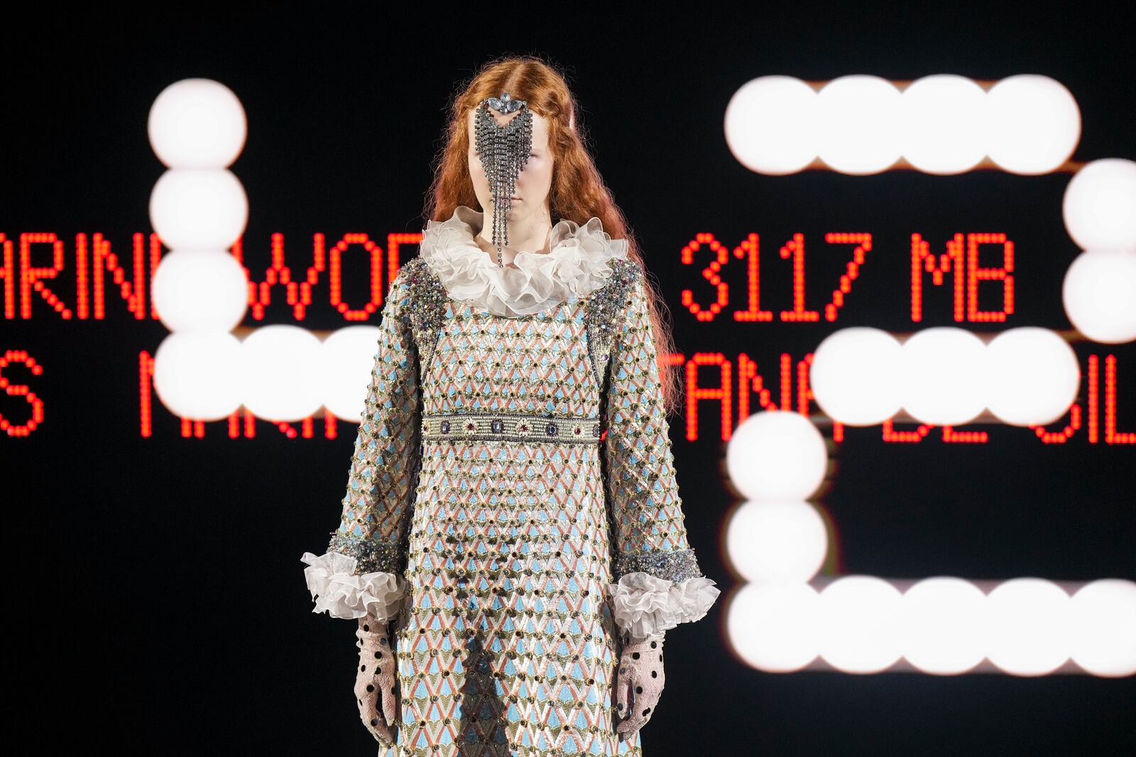 A model wears a creation as part of the Valentino Haute Couture Spring Summer 2025 collection, that was presented in Paris, Wednesday, Jan. 29, 2025. (AP Photo/Lewis Joly).