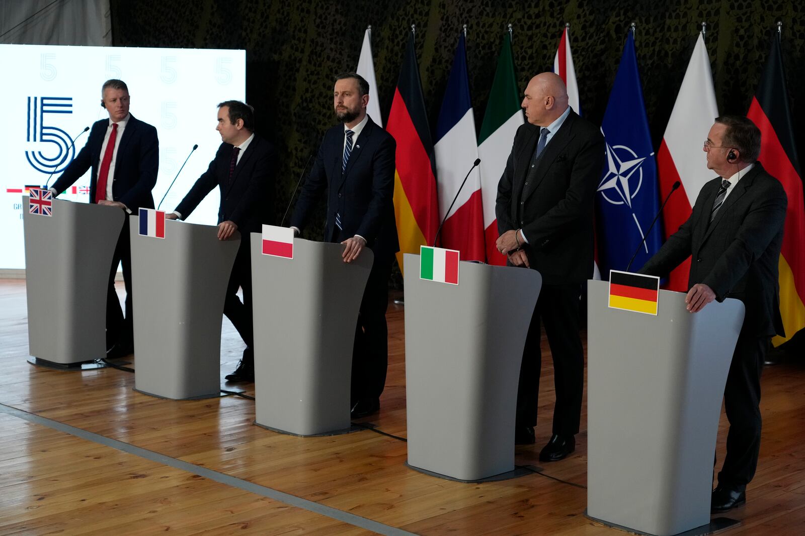 From left: Luke Pollard, Parliamentary Under-Secretary of State in the Britain's Ministry of Defence, France's Minister of the Armed Forces Sebastien Lecornu, Poland's Minister of National Defence Wladyslaw Kosiniak-Kamysz, Italy's Minister of Defence Guido Crosetto, and Germany's Federal Minister of Defence Boris Pistorius attend a news conference after a meeting of defense ministers of five NATO countries to discuss coordinating their defense plans and support for Ukraine, in the village of Helenow, near Warsaw, Poland, Monday, Jan. 13, 2025. (AP Photo/Czarek Sokolowski)