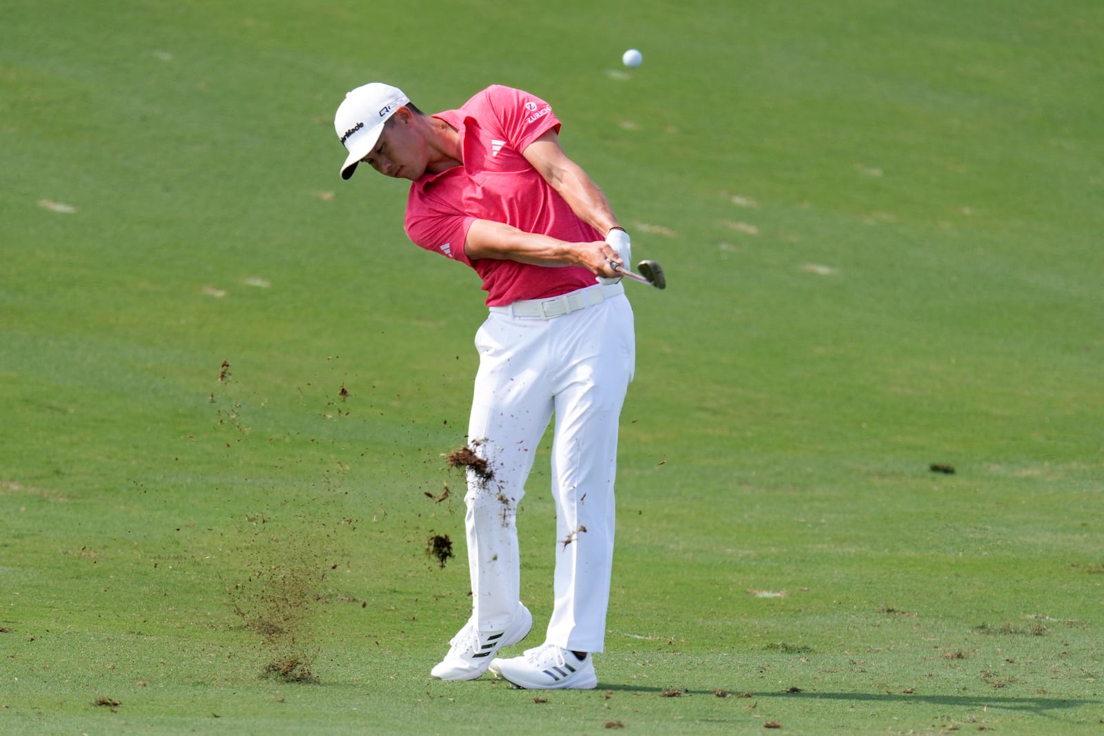 Collin Morikawa hits from the 13th fairway during the third round of The Sentry golf event, Saturday, Jan. 4, 2025, at Kapalua Plantation Course in Kapalua, Hawaii. (AP Photo/Matt York)