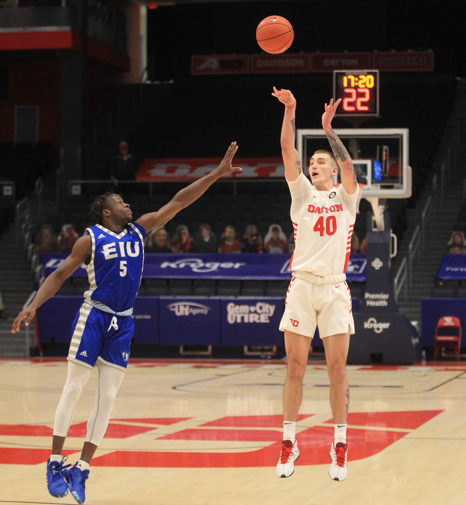 Dayton's Chase Johnson makes a 3-pointer against Eastern Illinois on Tuesday, Dec. 1, 2020, at UD Arena. David Jablonski/Staff