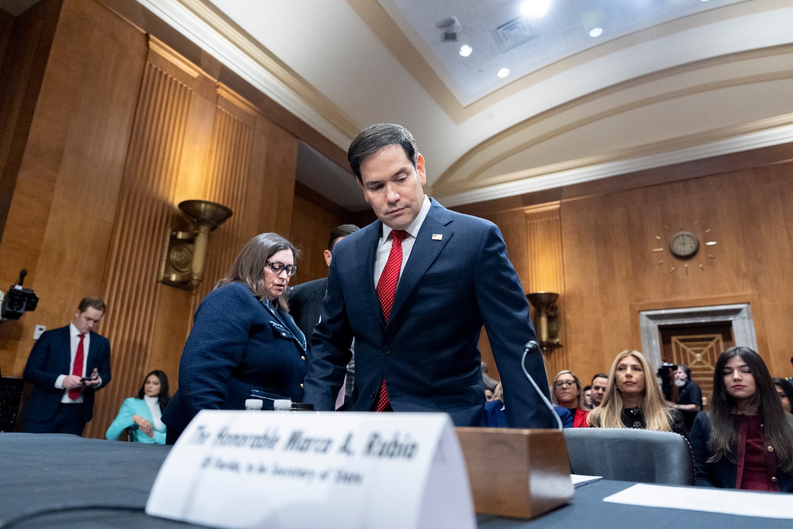 Sen. Marco Rubio, R-Fla., President-elect Donald Trump's choice to be Secretary of State, takes his seat before the Senate Foreign Relations Committee for his confirmation hearing, at the Capitol in Washington, Wednesday, Jan. 15, 2025. (AP Photo/Alex Brandon)