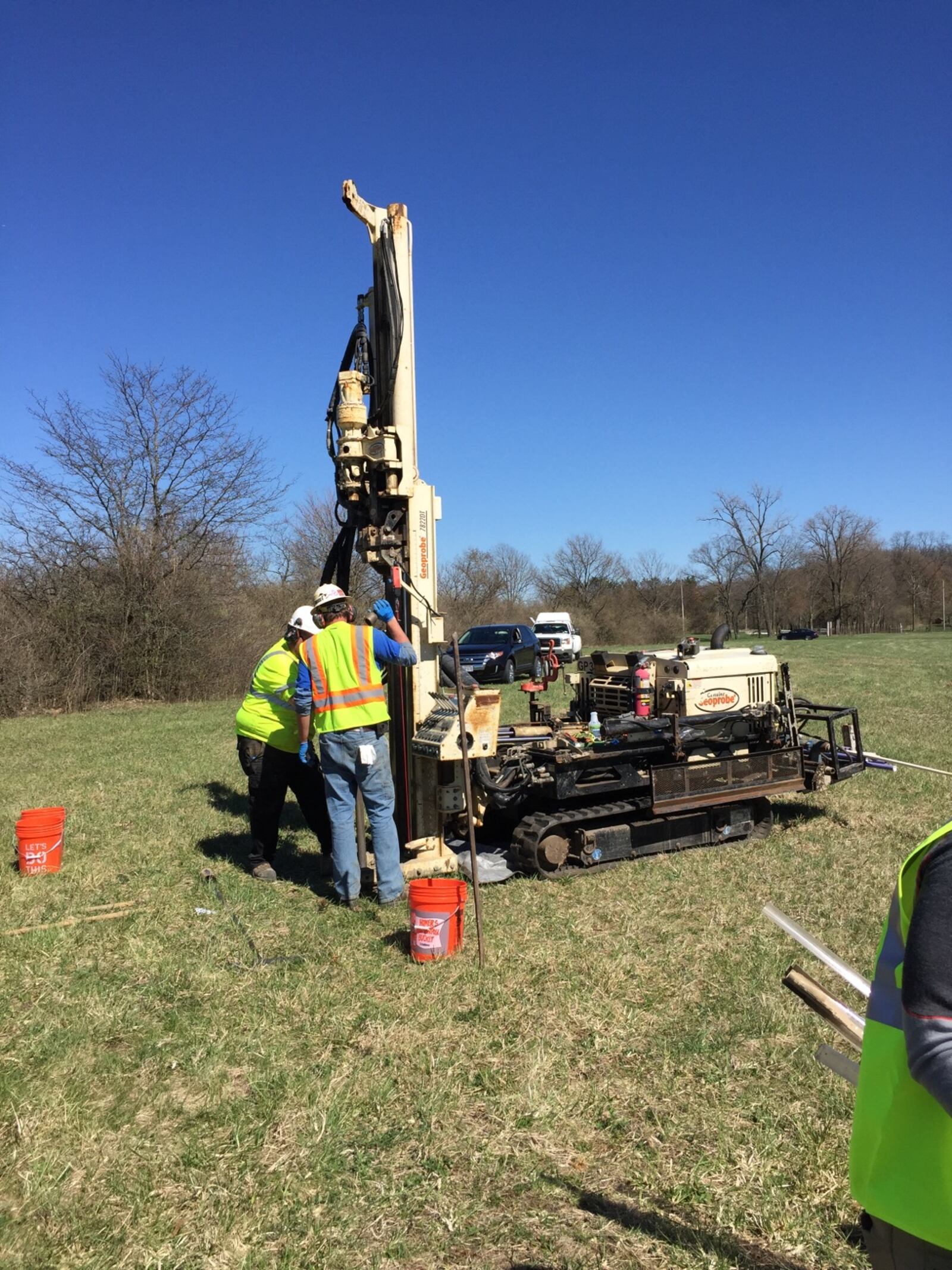 Wright Patterson Force Base crews collect drinking water samples from a field in Fairborn where a jet crashed in 1997. The base sampled 22 wells in nearby neighborhoods for a group of contaminants known as PFAS. Contributed