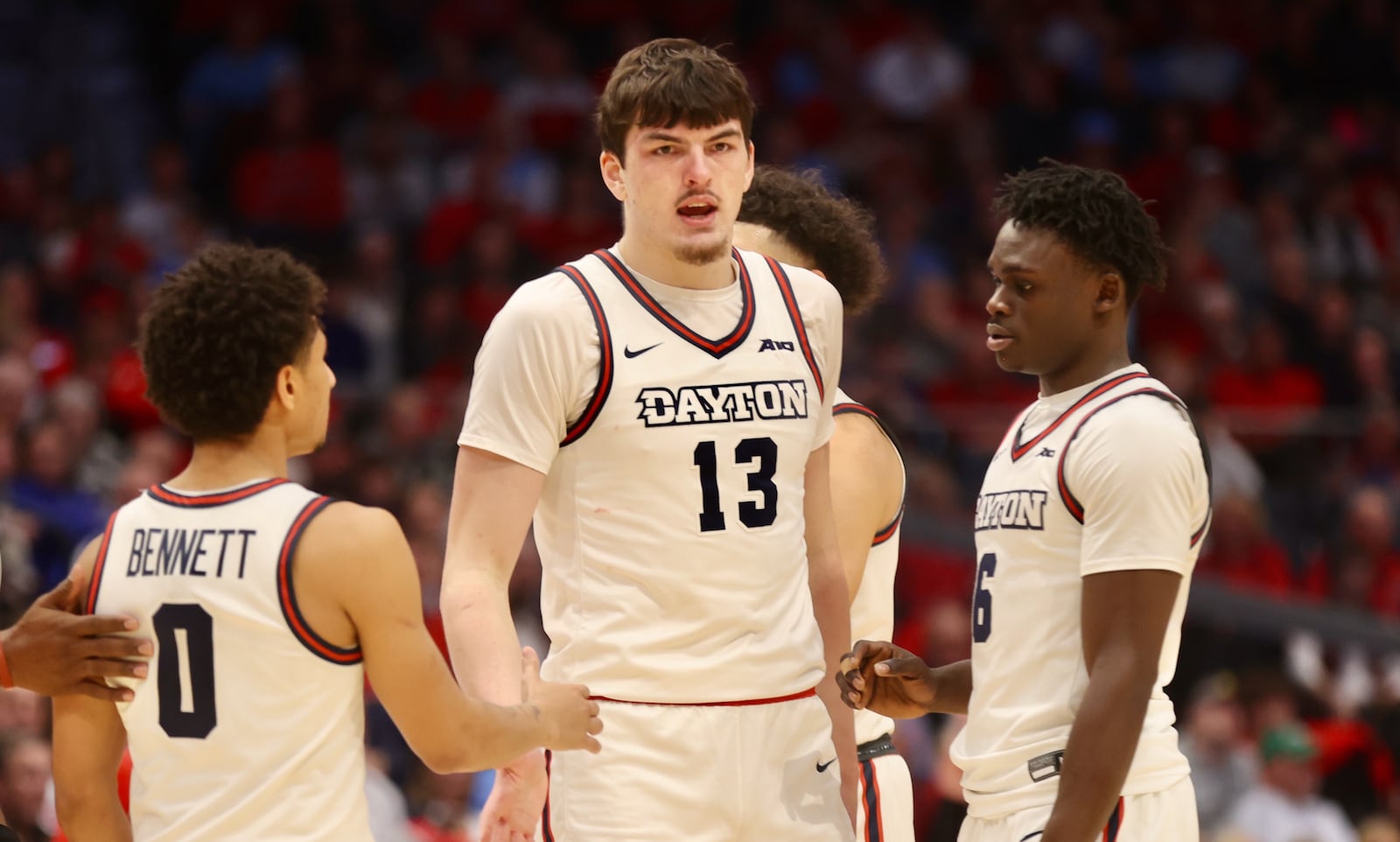 Dayton's Isaac Jack, center, reacts after drawing a foul against Youngstown State on Friday, Nov. 24, 2023, at UD Arena. David Jablonski/Staff