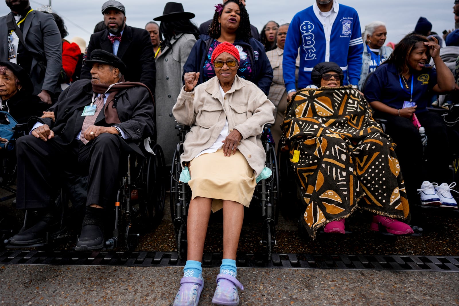 Annie Pearl Avery, one of the original foot soldiers reacts on crossing the Edmund Pettus bridge during the 60th anniversary of the march to ensure that African Americans could exercise their constitutional right to vote, Sunday, March 9, 2025, in Selma, Ala. (AP Photo/Mike Stewart)