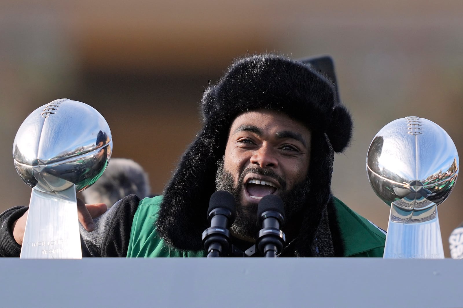 FILE - Philadelphia Eagles defensive end Brandon Graham speaks during the team's NFL football Super Bowl 59 parade and celebration, Friday, Feb. 14, 2025, in Philadelphia. (AP Photo/Matt Rourke, File)