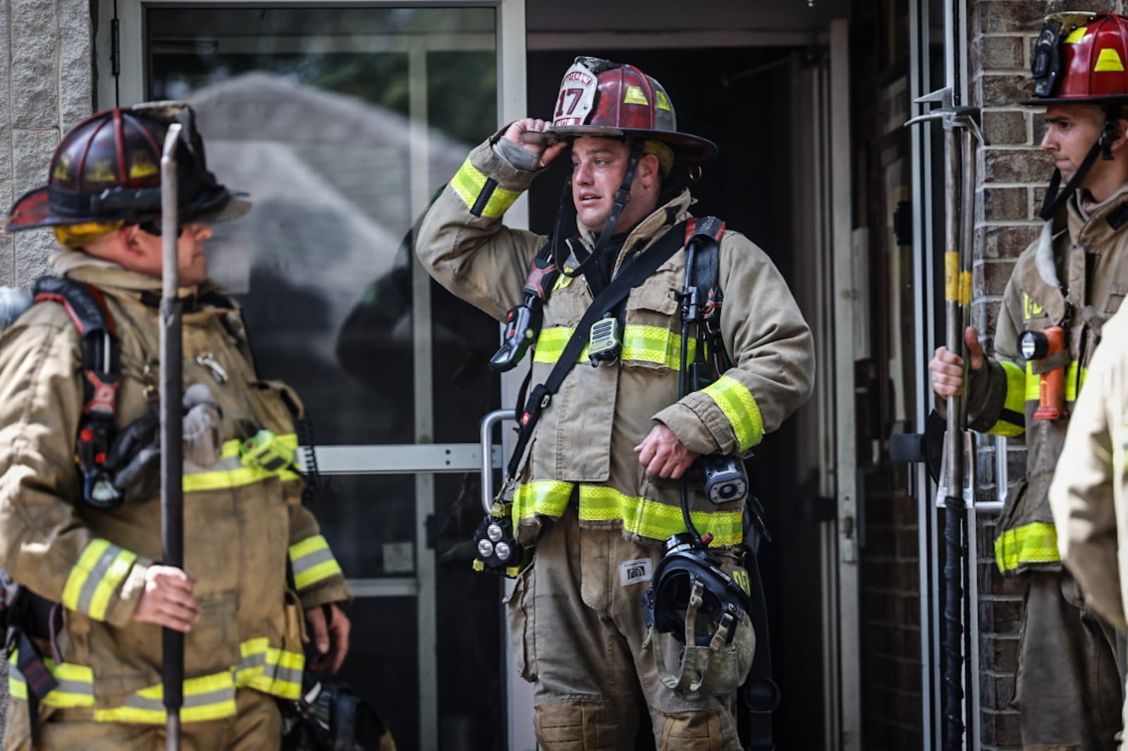 Dayton firefighters leave a smoky apartment fire on McDaniel Street Thursday afternoon on Aug. 29, 2024. The fire was on the seventh floor caused by cooking. Jim Noelker/Staff