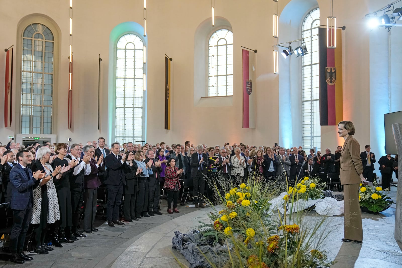 American journalist and historian Anne Applebaum gets standing ovations after she was awarded the Peace Prize of the German Publishers and Booksellers Association during a ceremony at the St. Paul's Church in Frankfurt, Germany, Sunday, Oct. 20, 2024.(AP Photo/Martin Meissner, Pool)