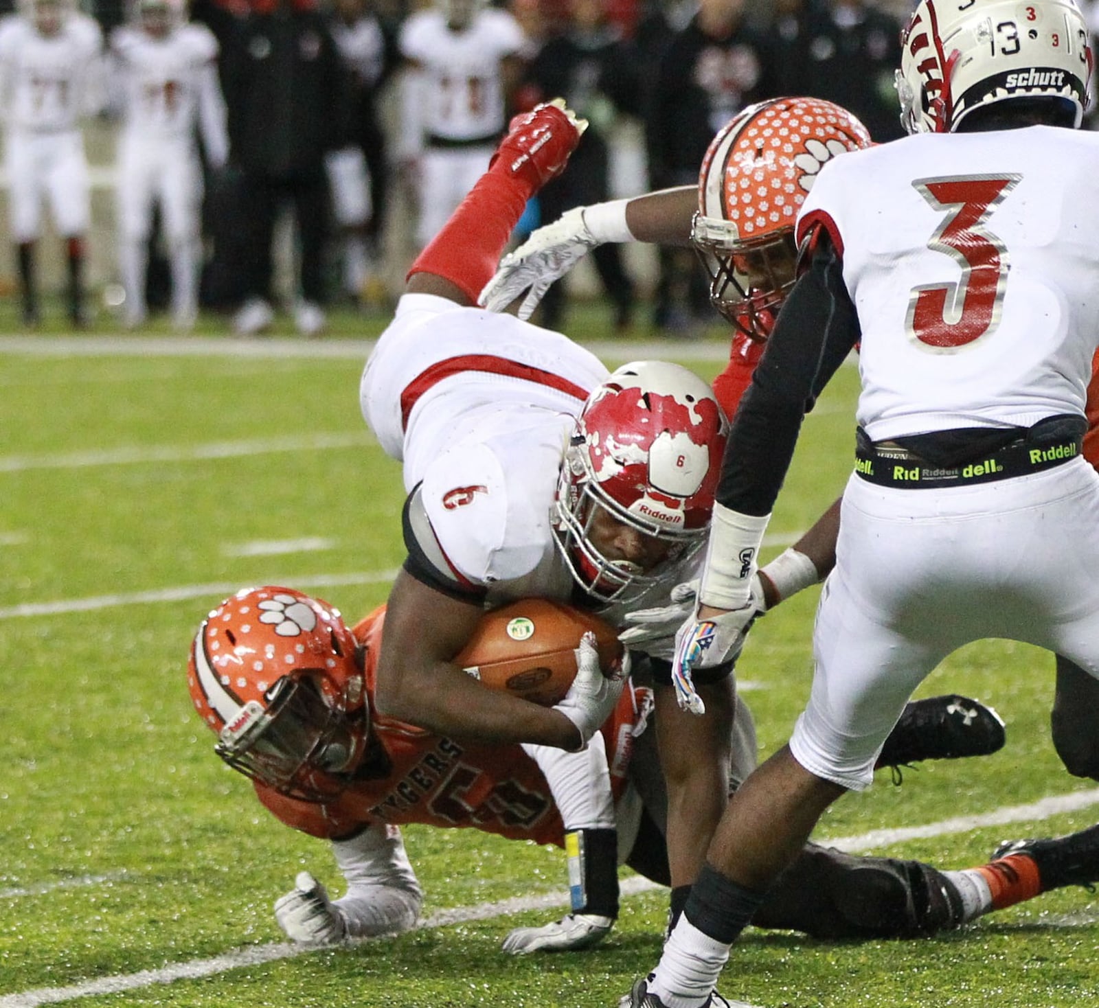 Ke’Shawn Huguely of Trotwood-Madison (with ball) makes a short gain. MARC PENDLETON / STAFF