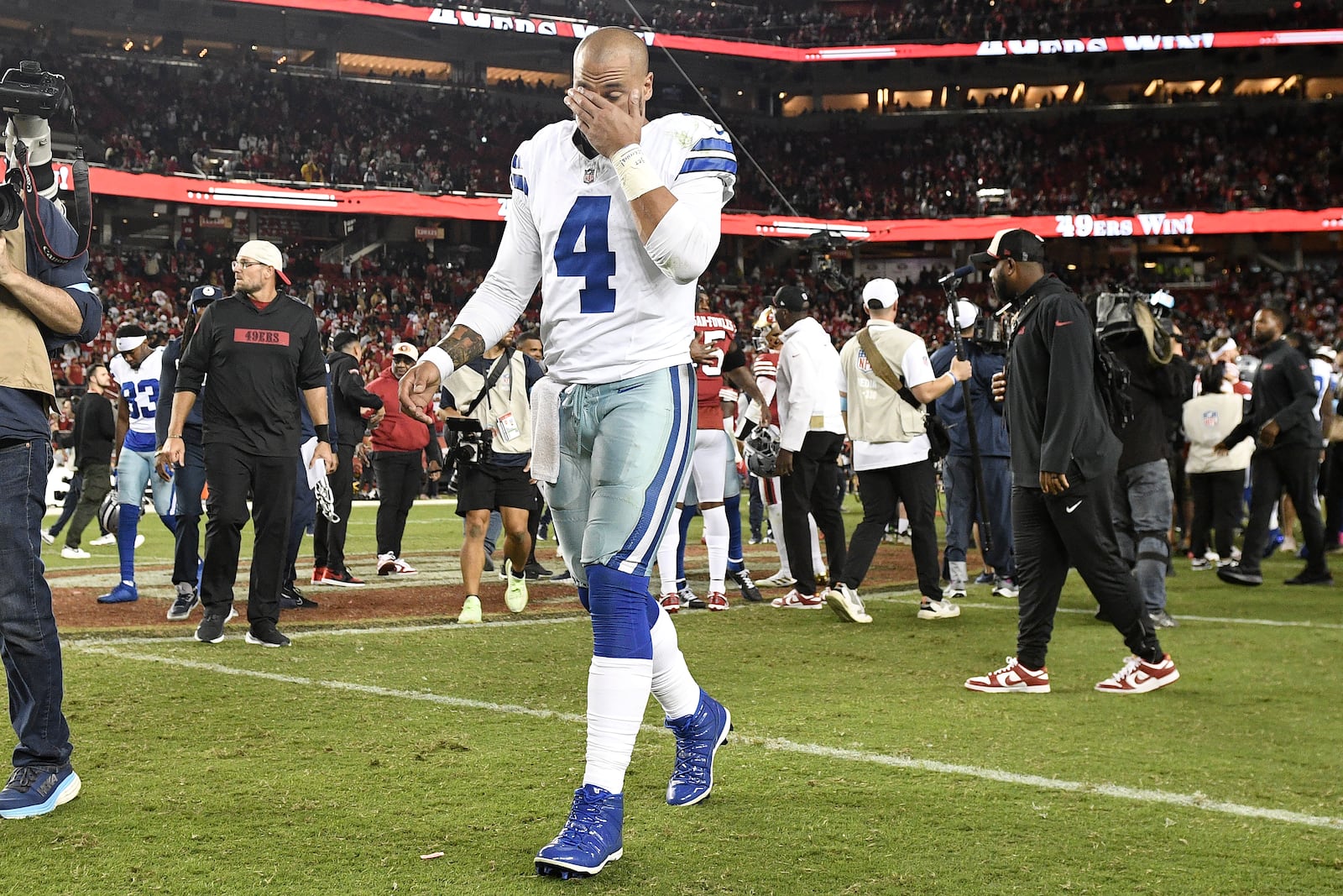 Dallas Cowboys quarterback Dak Prescott (4) walks off the field after an NFL football game against the San Francisco 49ers in Santa Clara, Calif., Sunday, Oct. 27, 2024. (AP Photo/Eakin Howard)