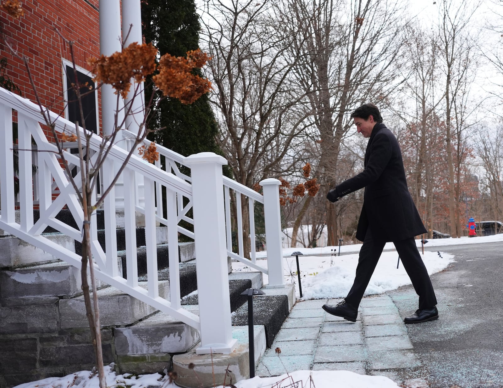 Canada Prime Minister Justin Trudeau leaves a news conference after announcing his resignation as Liberal leader outside Rideau Cottage in Ottawa on Monday, Jan. 6, 2025. (Sean Kilpatrick/The Canadian Press via AP)