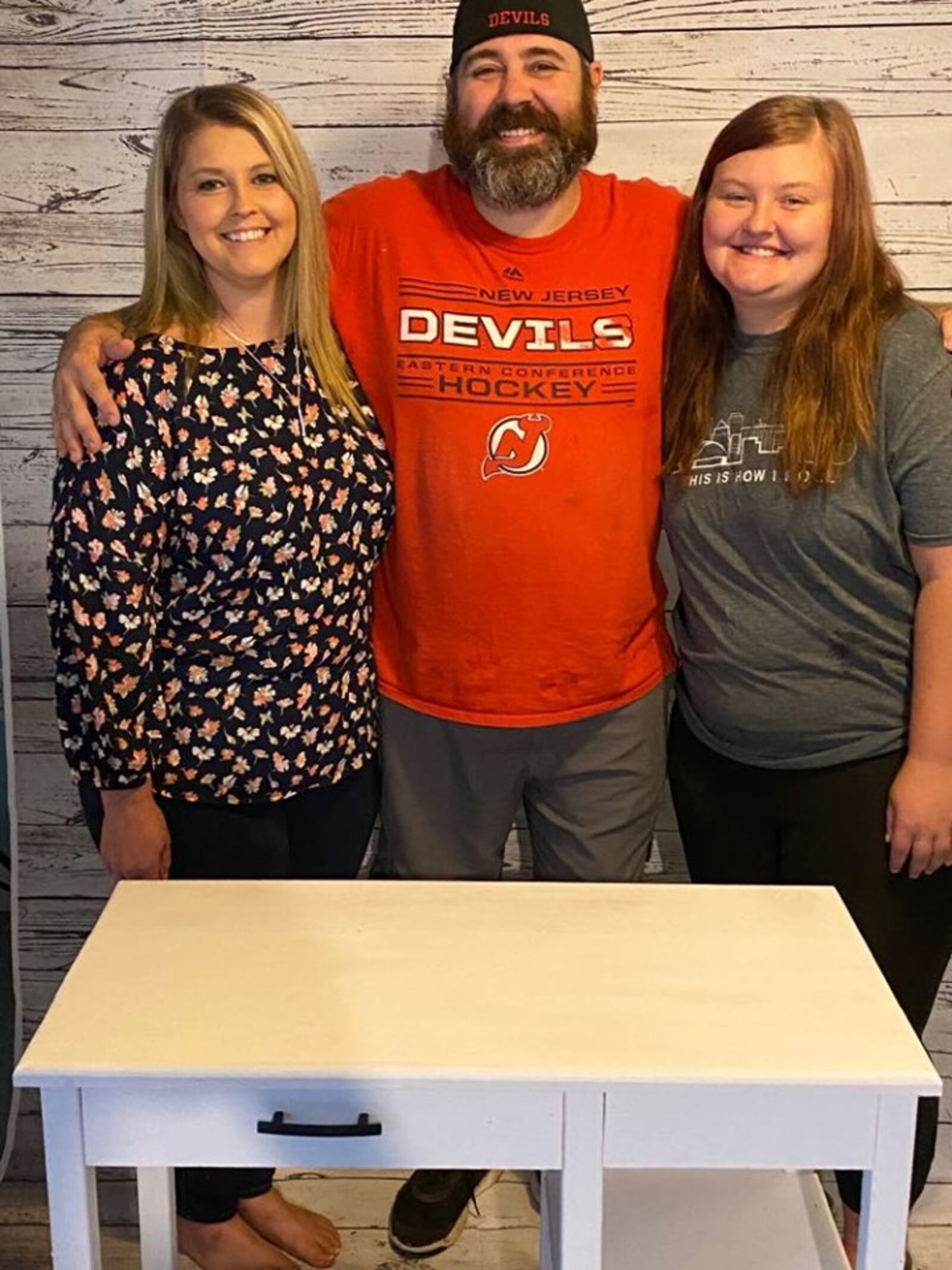 Sarah, Jim and Grace DesLaurier are making custom desks for students learning at home.