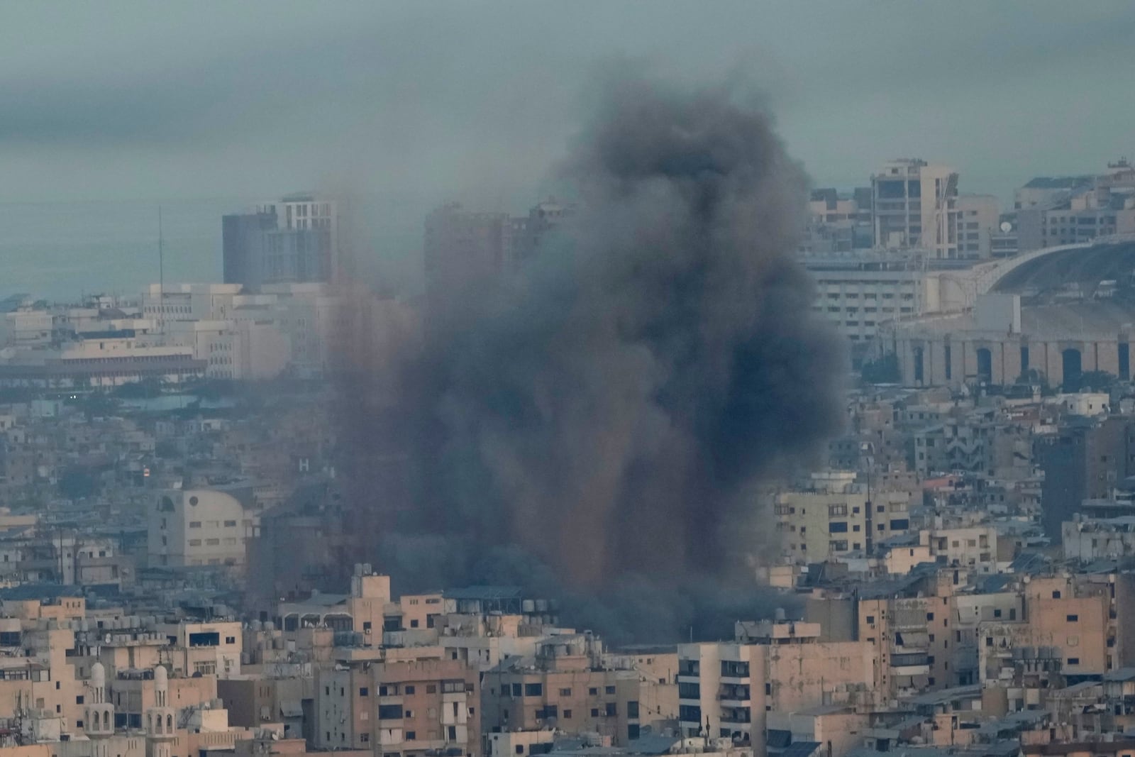 Smoke rise from Israeli airstrikes on Dahiyeh, Beirut's southern suburbs, Lebanon, Wednesday, Oct. 16, 2024. (AP Photo/Hussein Malla)