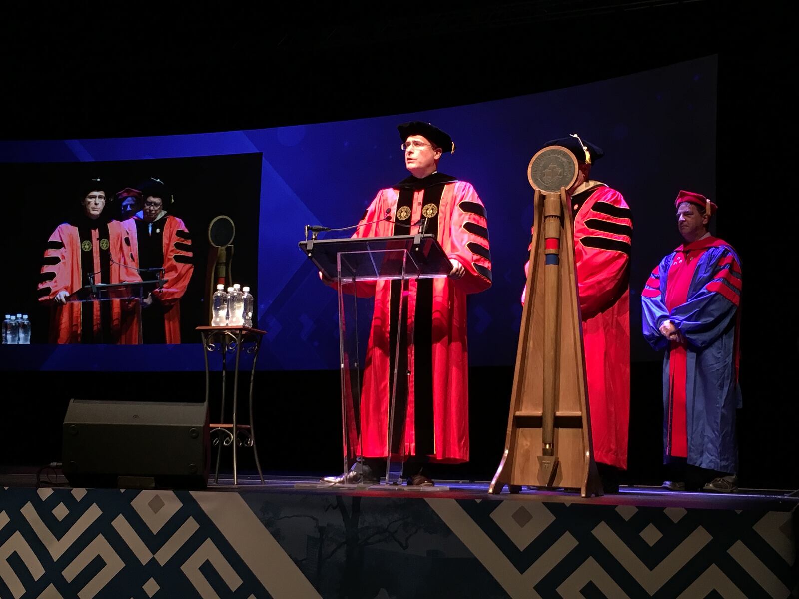 Eric Spina (left) at his inauguration as the University of Dayton’s 19th president in a ceremony, April 4, 2017 at UD Arena. LISA POWELL/STAFF