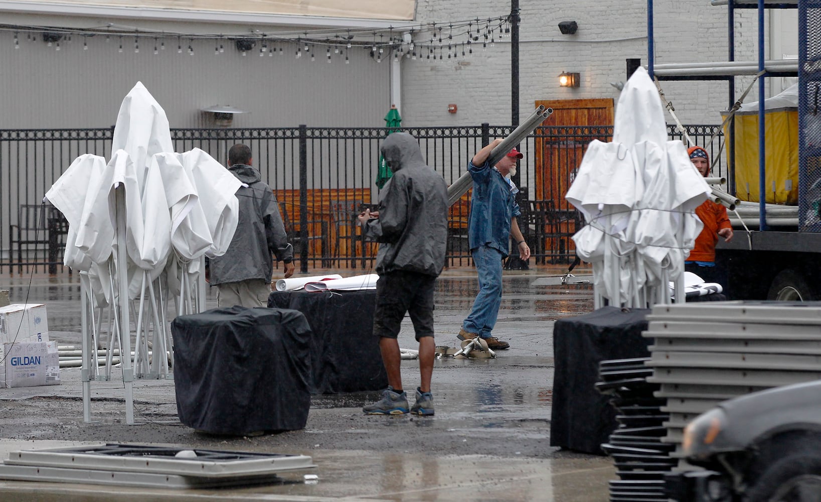 PHOTOS: Crews, party guests work to clean up Oregon District after Gem City Shine block party